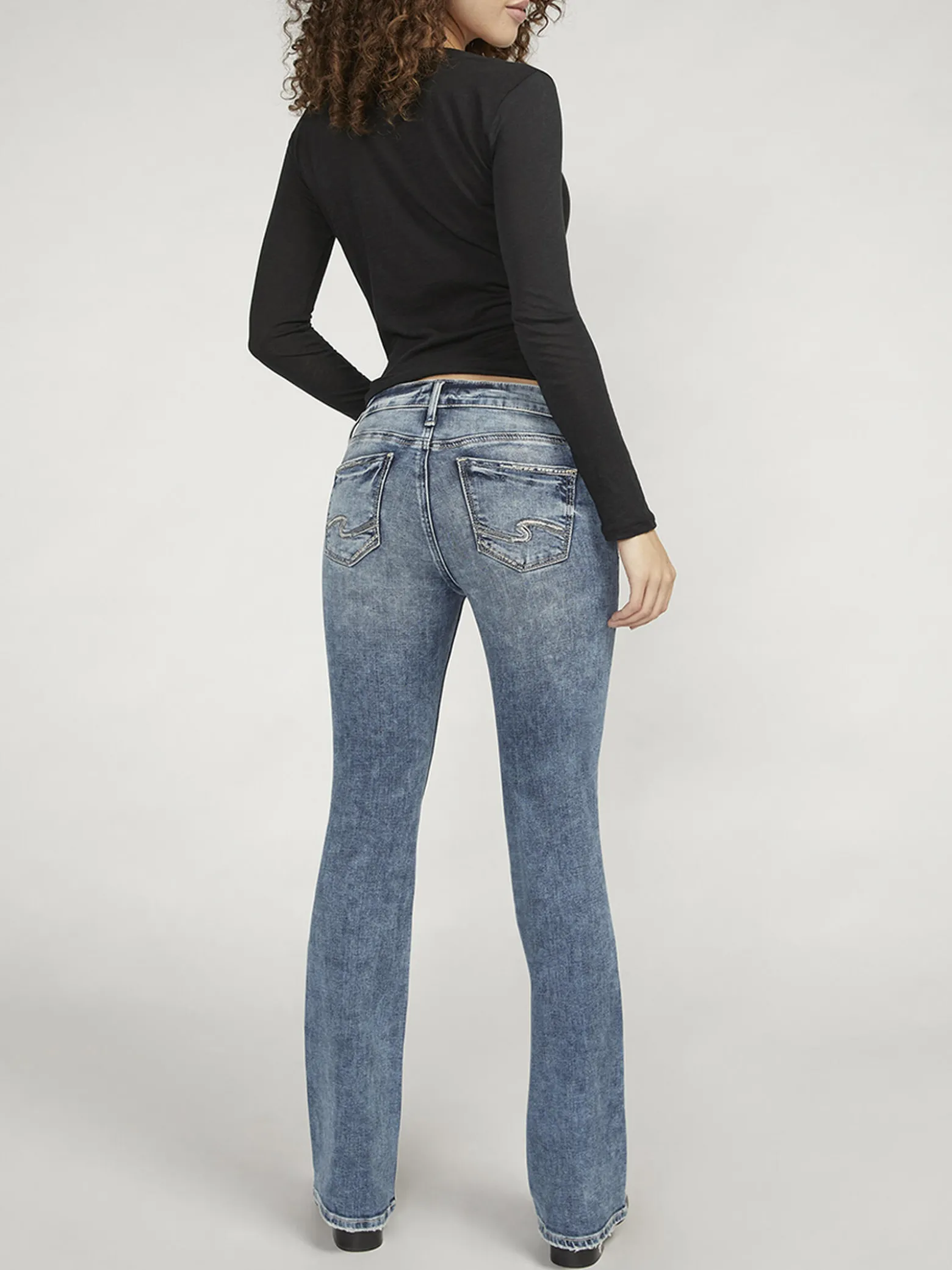 Suki Mid Rise Bootcut Jeans